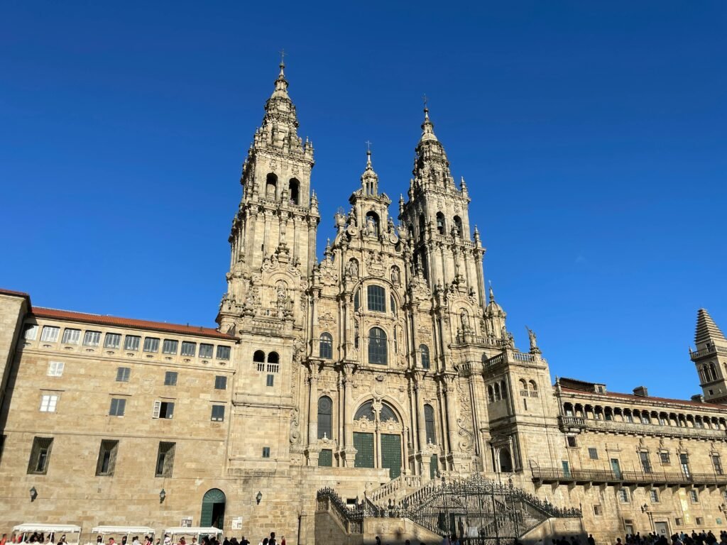 Stunning view of the Santiago de Compostela Cathedral under a clear blue sky.